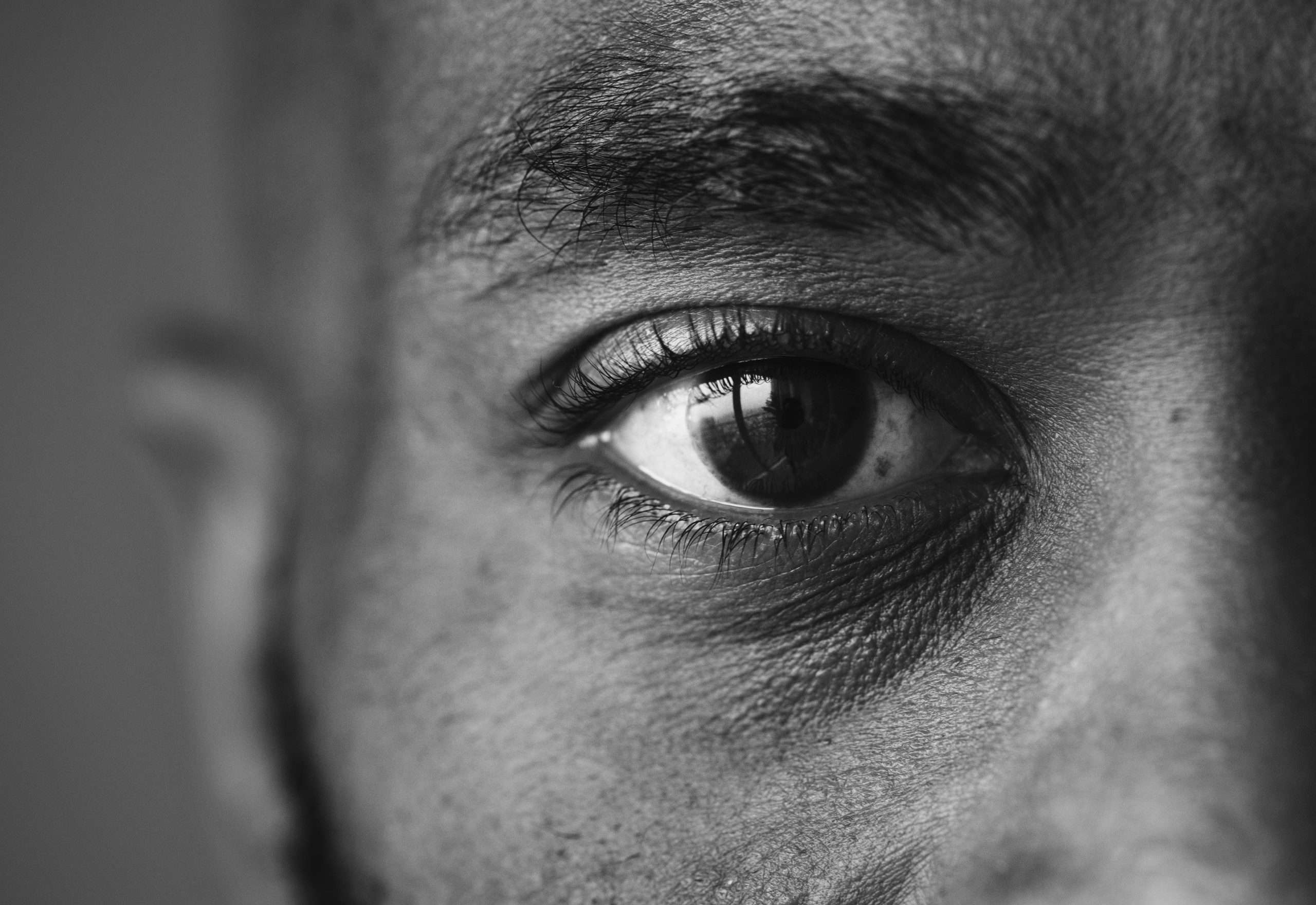 Closeup of an eye of a black man